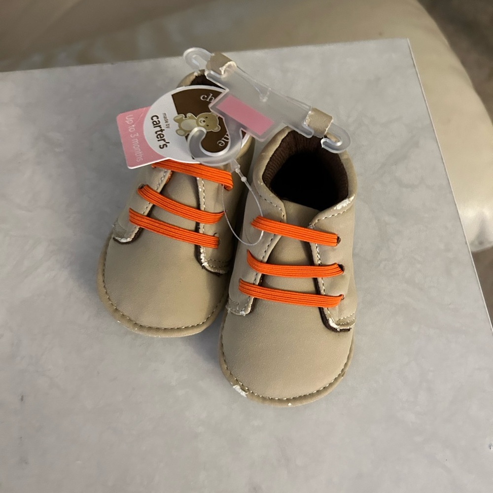 Carter's Child Of Mine baby boy light brown crib shoes are brand new.